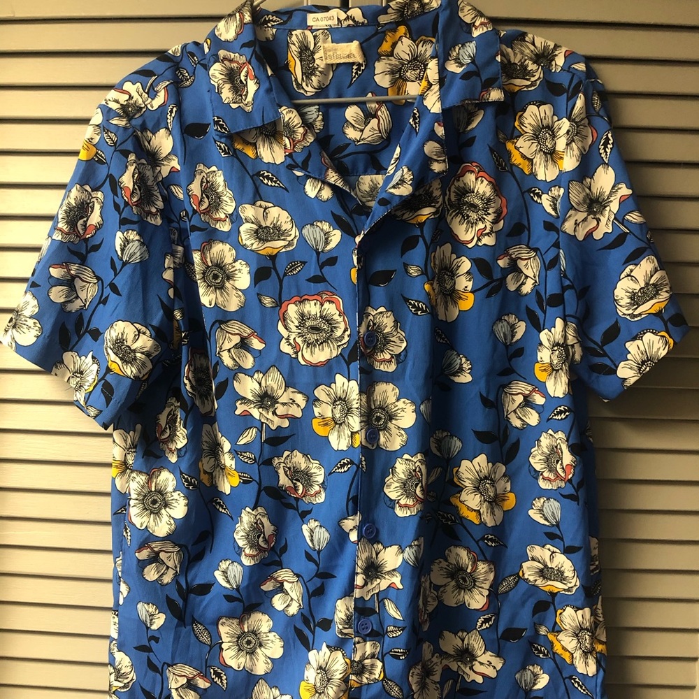 Floral print button up tee.